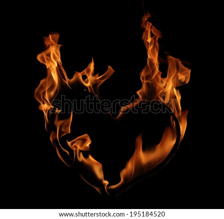 a flame of fire in the form of heart on a black background