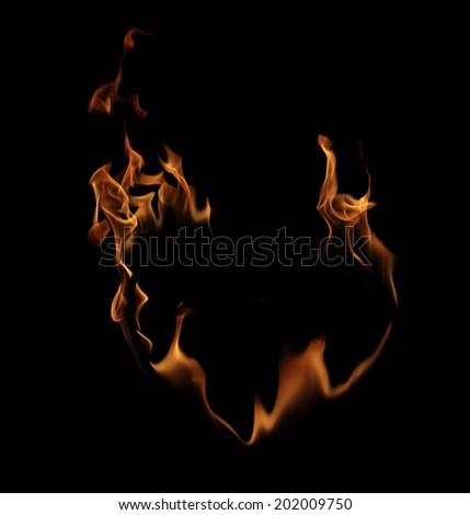 High resolution flame of fire in a burning heart isolated on black background