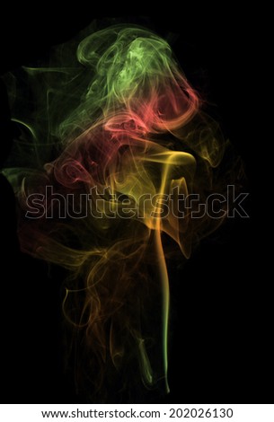 color abstract beautiful wisp of smoke rises isolated on black background