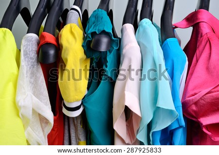 multicolored womens clothing hanging on the hanger  horizontal