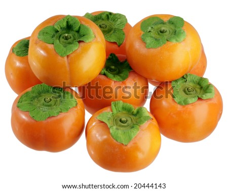 Stack of persimmon fruits isolated on white