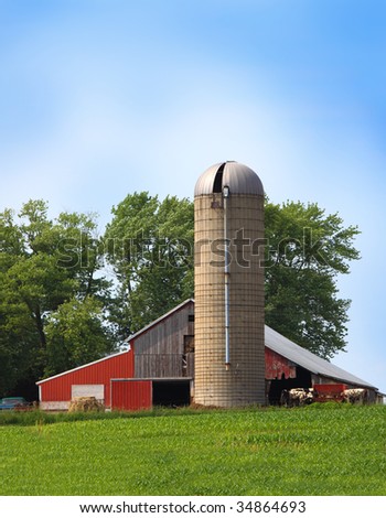 Old barn and silo tower on the farm