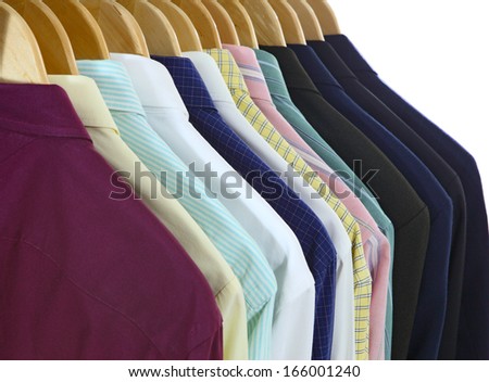 Suits and shirts on hanger isolated on white