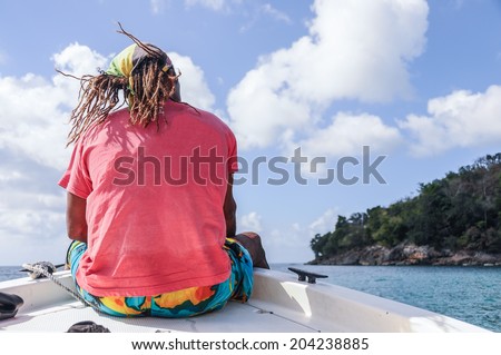 Local Rasta in a boat trip San Andres caribbean island. Colombia. South America. Latin American Culture.