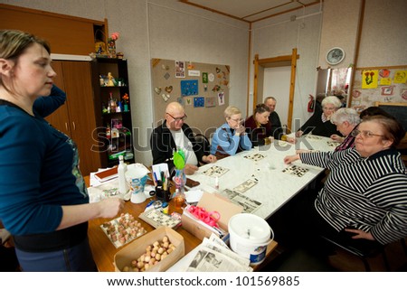 PODPOROZHYE, RUSSIA - MAY 3: Day of Health in Center of social services for pensioners and disabled (Lotto - exercises for development of attention for eldery), May 3, 2012 in Podporozhye, Russia.