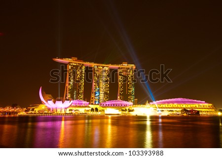 SINGAPORE - APRIL 15: Marina Bay Sands Hotel in night on April 15, 2012 on Singapore. This hotel is billed as the world\'s most expensive standalone casino property at S$8 billion.