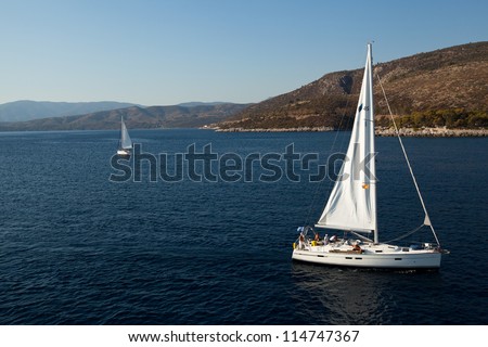 SARONIC GULF, GREECE - SEPTEMBER 28: Competitors boats during of sailing regatta \