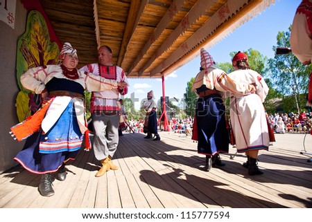 VINNICI, LEN.REGION, RUSSIA - JUNE 10: Unidentified participants at annual holiday Vepsian (Small Russian People) national culture Tree of Life (vepssk.Elo-pu), June 10, 2012 in Vinnici, Russia.