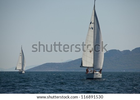 SARONIC GULF, GREECE - SEPTEMBER 25: Competitors boats during of sailing regatta 