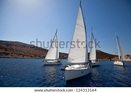 SARONIC GULF, GREECE - SEPT 24: Competitors boats during of sailing regatta \