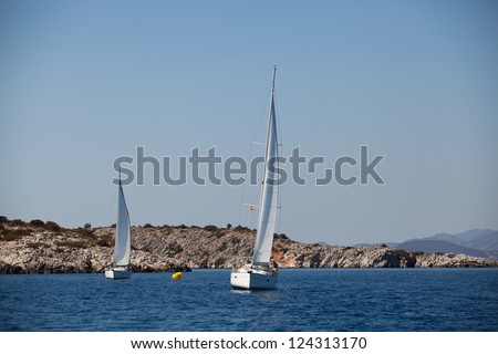 SARONIC GULF, GREECE - SEPT 24: Competitors boats during of sailing regatta \