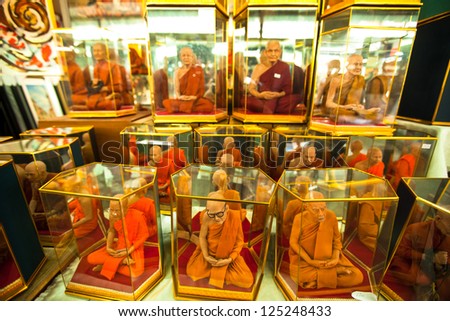 BANGKOK - APR 24: Shop windows with mannequins monks at Chatuchak Weekend Market April 24, 2012 in Bangkok. Chatuchak is one of the world\'s largest markets covering over 35 acres with 15,000 stalls.