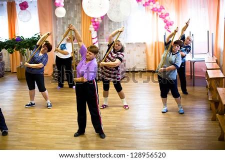 PODPOROZHYE, RUSSIA - OCT 11: Fitness training for elderly and disabled in program Day of Health in Center of social services for pensioners and disabled Otrada, Oct 11, 2012 in Podporozhye, Russia.