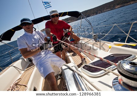 SARONIC GULF, GREECE - SEPTEMBER 25: Unidentified sailors participate in sailing regatta \