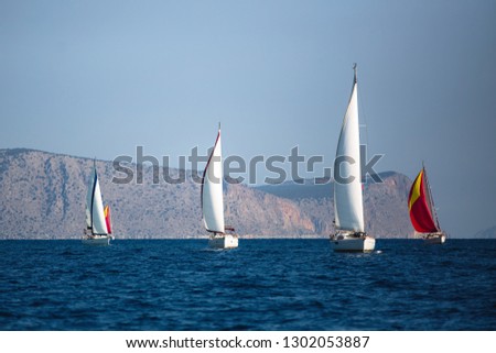 Adventure and luxury holiday. Sailing boats in the sail yacht regatta at Aegean Sea.
