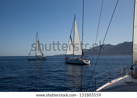 SARONIC GULF, GREECE - SEPTEMBER 26: Competitors boats during of sailing regatta \