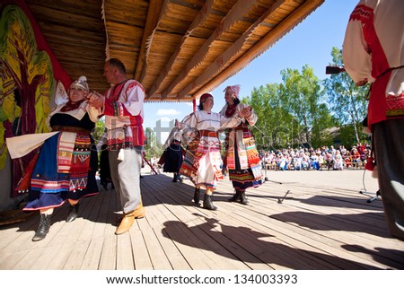 VINNICI, LENINGRAD REGION, RUSSIA - JUNE 10: Local people during celebrate the annual holiday Vepsian national culture Tree of Life (vepssk.Elo-pu), June 10, 2012 in the village Vinnici, Russia.