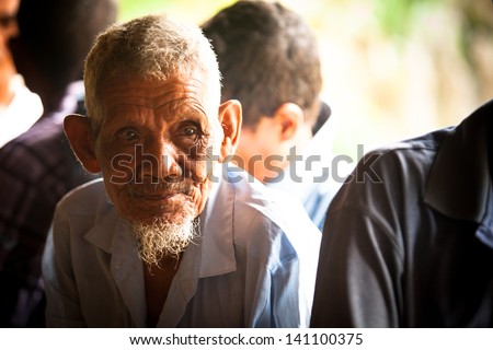 BERDUT, MALAYSIA - APR 8: Unidentified old man Orang Asli in his village on Apr 8, 2013 in Berdut, Malaysia. More than 76% of all Orang Asli live below the poverty line, life expectancy -53 years old.
