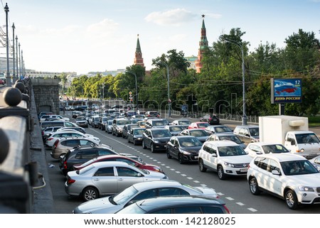 MOSCOW - JUNE 13: Cars stands in traffic jam on the city center, June 13, 2013, Moscow Russia. Moscow Mayor Sobyanin reconstructs suburban railways, to solve problem of traffic jams in 2016.