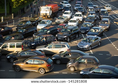 MOSCOW - JUNE 13: Cars stands in traffic jam on the city center, June 13, 2013, Moscow Russia. Moscow Mayor Sobyanin reconstructs suburban railways, to solve problem of traffic jams in 2016.