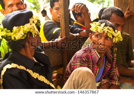 BERDUT, MALAYSIA - APR 8: Unidentified people Orang Asli in his village on Apr 8, 2013 in Berdut, Malaysia. More than 76% of all Orang Asli live below the poverty line, life expectancy - 53 years old.