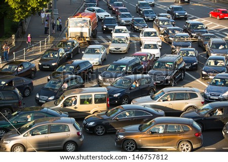 Moscow - June 13: Cars Stands In Traffic Jam On The City Center, June 13, 2013, Moscow Russia. Moscow Mayor Sobyanin Reconstructs Suburban Railways, To Solve Problem Of Traffic Jams In 2016.