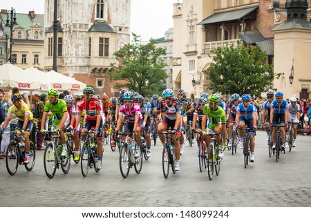 KRAKOW, POLAND - JULY 30: Unidentified participants of 70th Tour de Pologne cycling 3rd stage race, July 30, 2013 in Krakow, Poland. Tour de Pologne, the biggest cycling event in Eastern Europe.