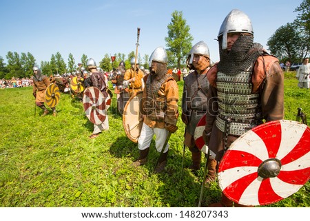 STARAYA LADOGA, RUSSIA - JULY 13: Unidentified participants during of international historical festival of medieval culture Ladogafest-2013 (12-14 of Jul) on July 13, 2013 on Staraya Ladoga, Russia.