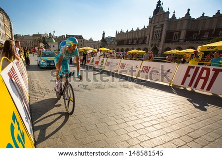 KRAKOW, POLAND - AUGUST 3: Unidentified participant of 70th Tour de Pologne cycling 7th stage race, August 3, 2013 in Krakow, Poland. Tour de Pologne, the biggest cycling event in Eastern Europe.