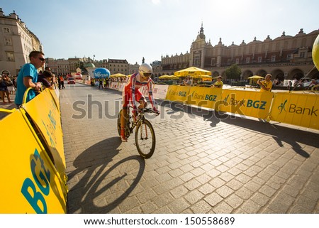 KRAKOW, POLAND - AUGUST 3: Unidentified participant of 70th Tour de Pologne cycling 7th stage race, August 3, 2013 in Krakow, Poland. Tour de Pologne, the biggest cycling event in Eastern Europe.
