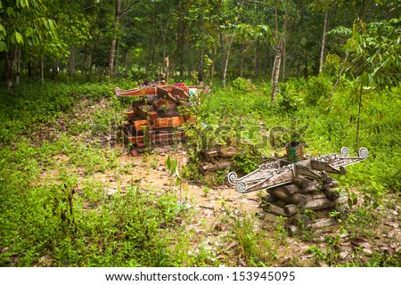 BERDUT, MALAYSIA - APR 8: Cemetery in village Orang Asli in his village on Apr 8, 2013 in Berdut, Malaysia. More than 76% of all Orang Asli live below the poverty line, life expectancy - 53 years old.