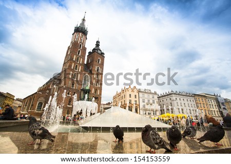 KRAKOW, POLAND - SEN 12: The Main Square is the main market square of the Old Town, Sen 12, 2013 in Krakow, Poland. Main Square also is principal urban space located at the center of the city.