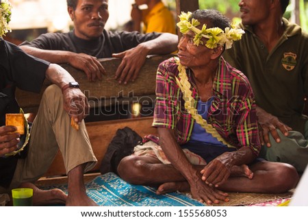 BERDUT, MALAYSIA - APR 8: Unidentified man Orang Asli in his village on Apr 8, 2013 in Berdut, Malaysia. More than 76% of all Orang Asli live below the poverty line, life expectancy - 53 years old.