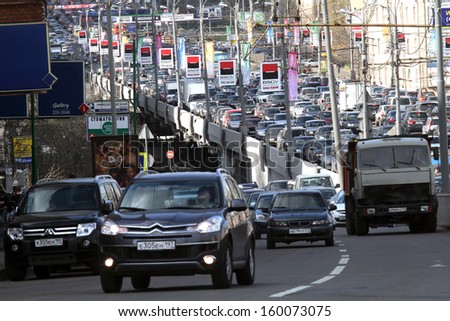 MOSCOW - APR 29: Cars stands in traffic jam on the city center, April 29, 2011, Moscow Russia. In Moscow continues rapid growth cars park, now more than 380 cars per 1,000 inhabitants.