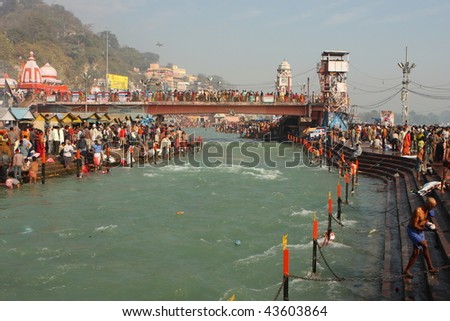 HARIDWAR, INDIA - JANUARY 14: Puja ceremony on the banks of Ganga river. People celebrate Makar Sankranti, huge Religious festival regarding Sun and Harvest, January 14, 2009 in Haridwar, India.