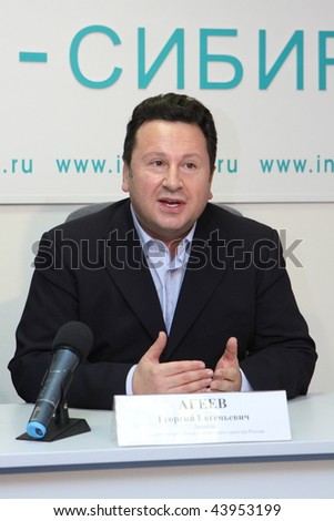 TOMSK, RUSSIA - December 4: George Ageev - Director of the National Philharmonic Orchestra of Russia at a press conference in agency Interfax-Siberia, December 4, 2009 in Tomsk, Russia.