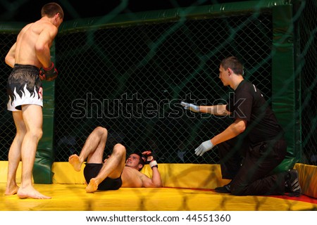 TOMSK, RUSSIA - JULY 2: Fight in championship of Russia of mixed fighting single combats, July 2, 2009 in Tomsk, Russia.
