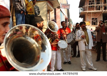 HARIDWAR, INDIA - JANUARY 14: Street musicians at the festival of Kumbha Mela, huge Religious festival regarding Sun and Harvest, January 14, 2009 in Haridwar, India.