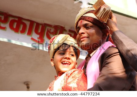 HARIDWAR, INDIA - JANUARY 14: The groom (R) and his little friend (L) in a traditional Indian wedding, January 14, 2009 in Haridwar, India.