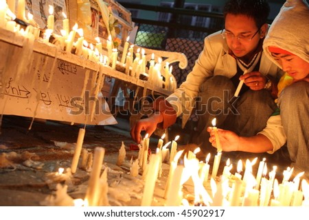 GANGTOK, INDIA - NOVEMBER 30: People light up candles in memory of victims of terrorist attack in Mumbai on November 30, 2008 in Gangtok, India.
