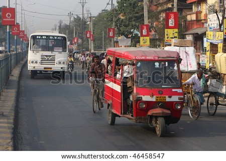 SILIGURI, INDIA - DECEMBER 4: Streets Siliguri -is a city the transit point for air, road and rail traffic to of Nepal, Bhutan, Bangladesh and indian state Sikkim, December 4, 2008 in Siliguri, India.