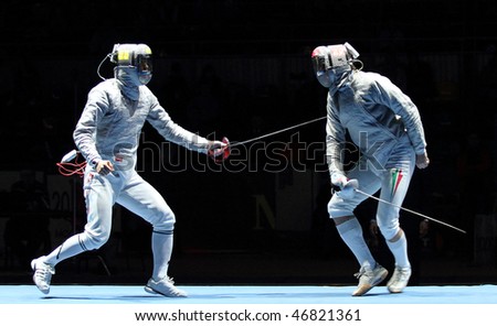 MOSCOW, RUSSIA - FEBRUARY 13: Duel for Cup Grand Prix event, Eun S.Oh (KOR) and Zsolt Nemcsik (HUN) compete at the 2010 RFF Moscow Saber World Fencing Tournament, February 13, 2010 in Moscow, Russia.