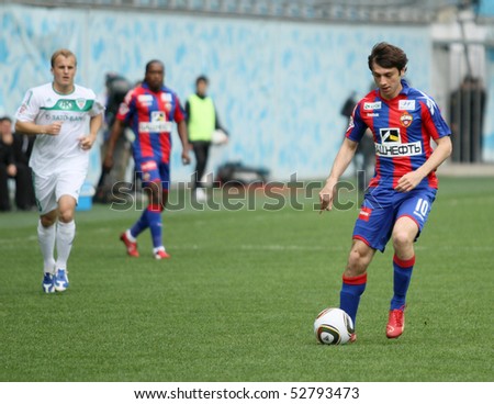 MOSCOW - MAY 10: CSKAs Alan Dzagoev (R) in action during their teams Russian football championship game CSKA (Moscow) vs. Terek (Grozny) - (4:1), May 10, 2010 in Moscow, Russia.