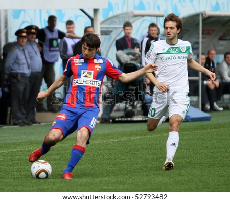 MOSCOW - MAY 10: CSKAs Alan Dzagoev (L) in action during their teams Russian football championship game CSKA (Moscow) vs. Terek (Grozny) - (4:1), May 10, 2010 in Moscow, Russia.