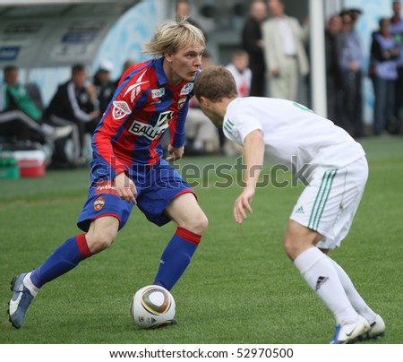 MOSCOW - MAY 10: CSKA's Milos Krasic (L) in action during their team's Russian football championship game CSKA (Moscow) vs. Terek (Grozny) - (4:1), May 10, 2010 in Moscow, Russia.