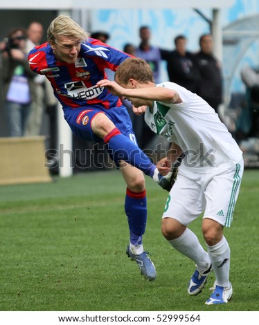MOSCOW - MAY 10: CSKA\'s Milos Krasic (L) in action during their team\'s Russian football championship game CSKA (Moscow) vs. Terek (Grozny) - (4:1), May 10, 2010 in Moscow, Russia.