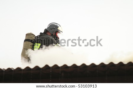 MOSCOW - APRIL 30: Firefighter extinguishes fire at the Viking floating restaurant on the Berezhkovskaya embankment, April 30, 2010 in Moscow, Russia.
