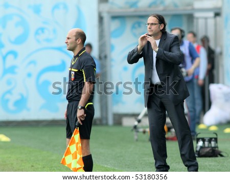 MOSCOW - MAY 15: Dinamo head coach Miodrag Bozovic during a game of the 11th round of Russian Football Premier League - Dinamo Moscow vs. Alania Vladikavkaz - 2:0, May 15, 2010 in Moscow, Russia.