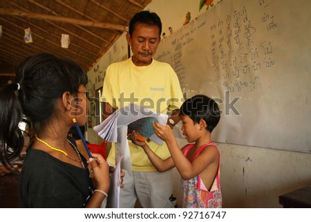 KO CHANG, THAILAND - JANUARY 6: Unknown children in lesson at school by project Cambodian Kids Care to help deprived children in deprived areas with education, on January 6, 2012 in Ko Chang, Thailand