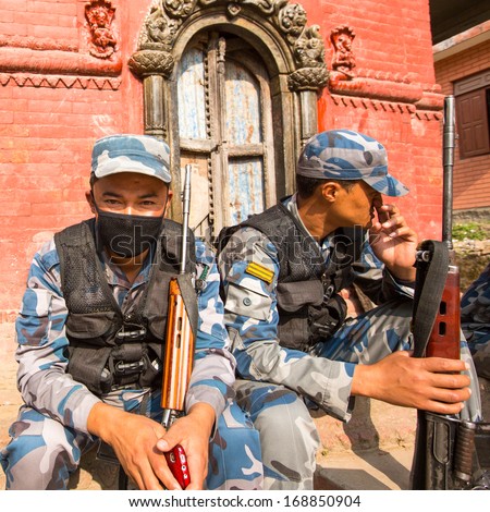 KATHMANDU, NEPAL - Oct 19: Unknown nepalese soldiers Armed Police Force near the public school, Dec 19, 2013 in Kathmandu, Nepal. Armed Police Force tasked with counterinsurgency operations in Nepal.